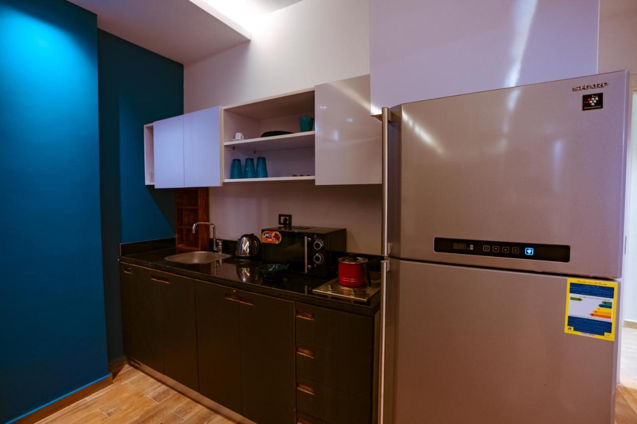 Travelholic Residence New Кайро Екстериор снимка